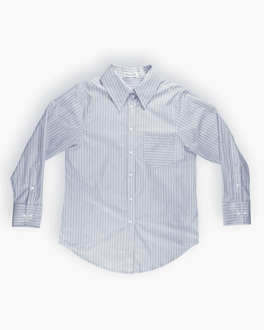 Blue_striped_button_up_boyfriend_shirt_with_a_white_calanthe_neck_label_and_a_white_background